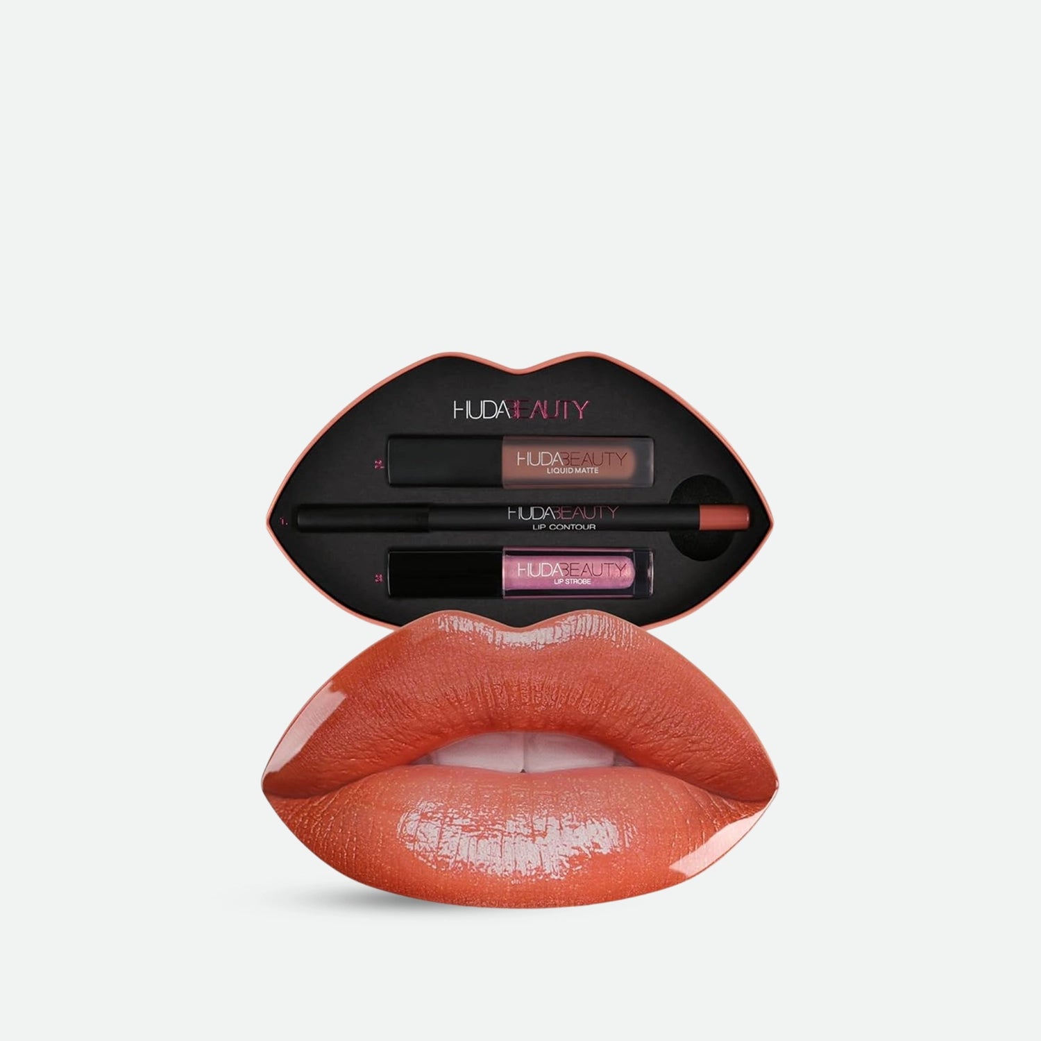 https://allurify.pk/products/huda-beauty-contour-and-strobe-lip-set?variant=48239696675132