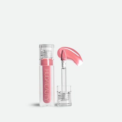 https://allurify.pk/collections/huda-beauty/products/huda-beauty-faux-filler-extra-shine-lip-gloss?variant=49400658788668