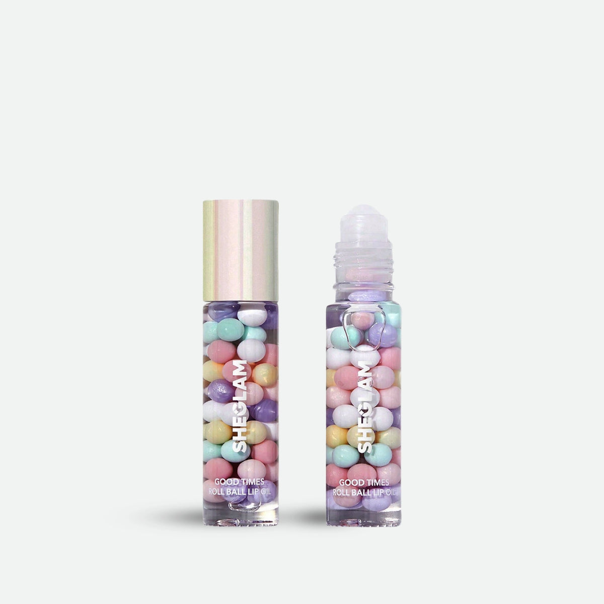 https://allurify.pk/collections/sheglam/products/sheglam-good-times-roll-ball-lip-oil?variant=51776213418300