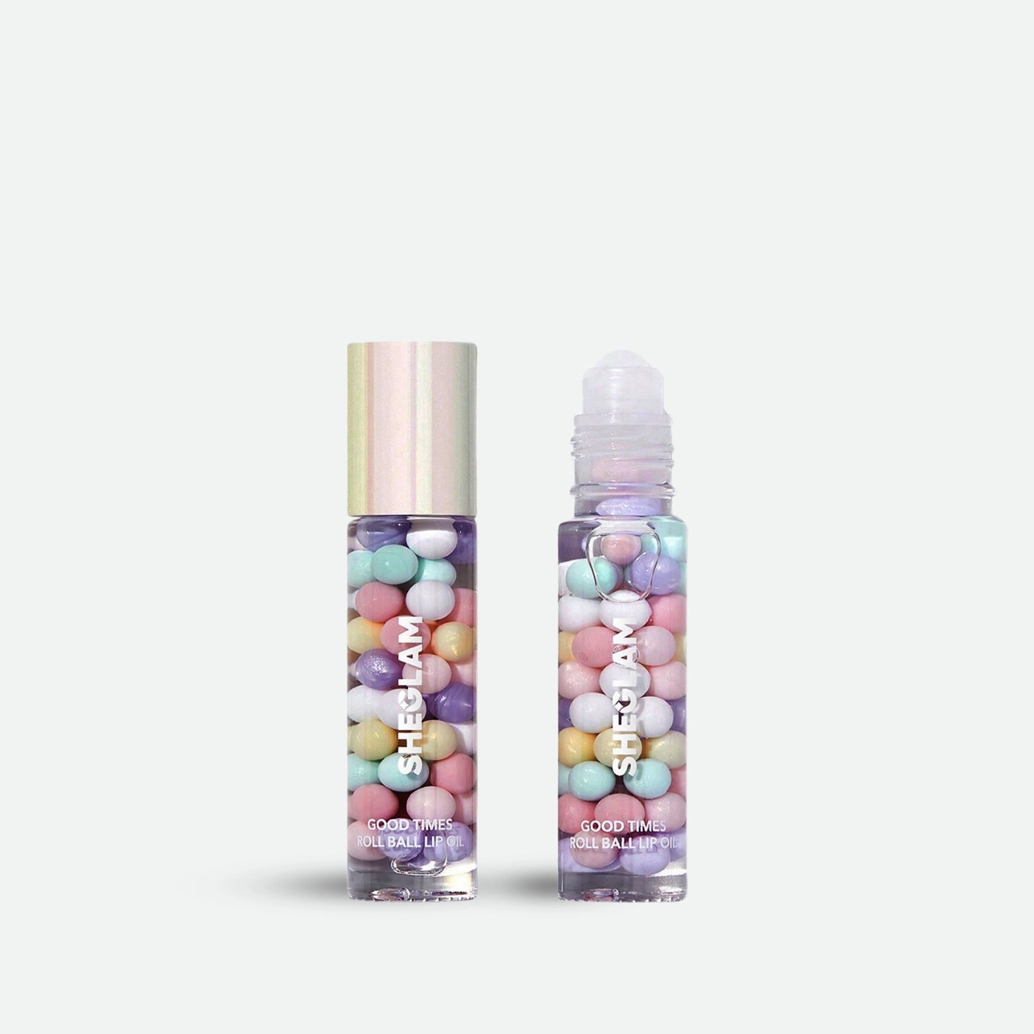 https://allurify.pk/collections/sheglam/products/sheglam-good-times-roll-ball-lip-oil?variant=51776213418300